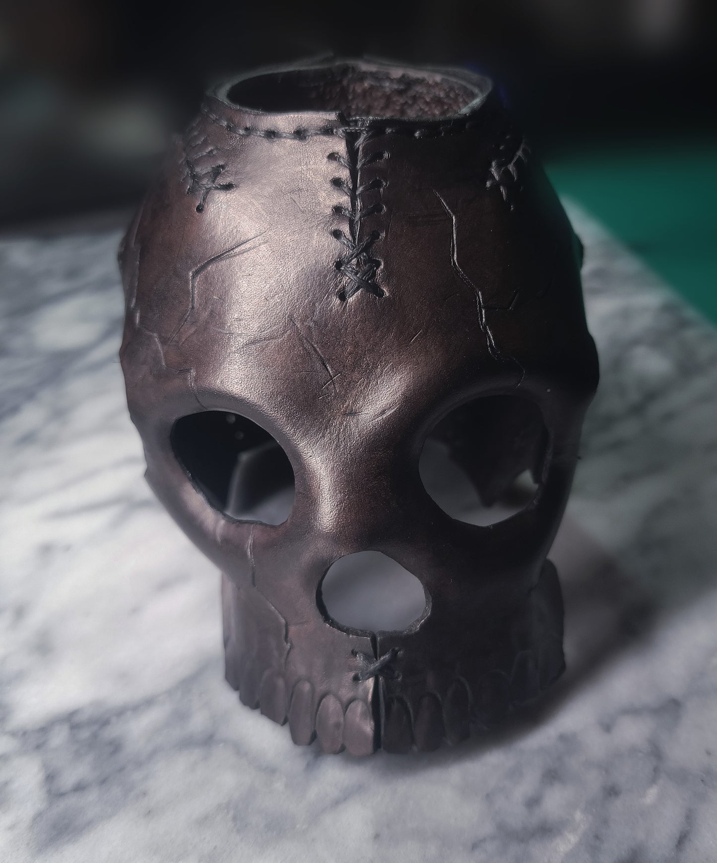 Mystic Shadows: Handcrafted Leather Skull Candle Holders for an Enchanting Atmosphere
